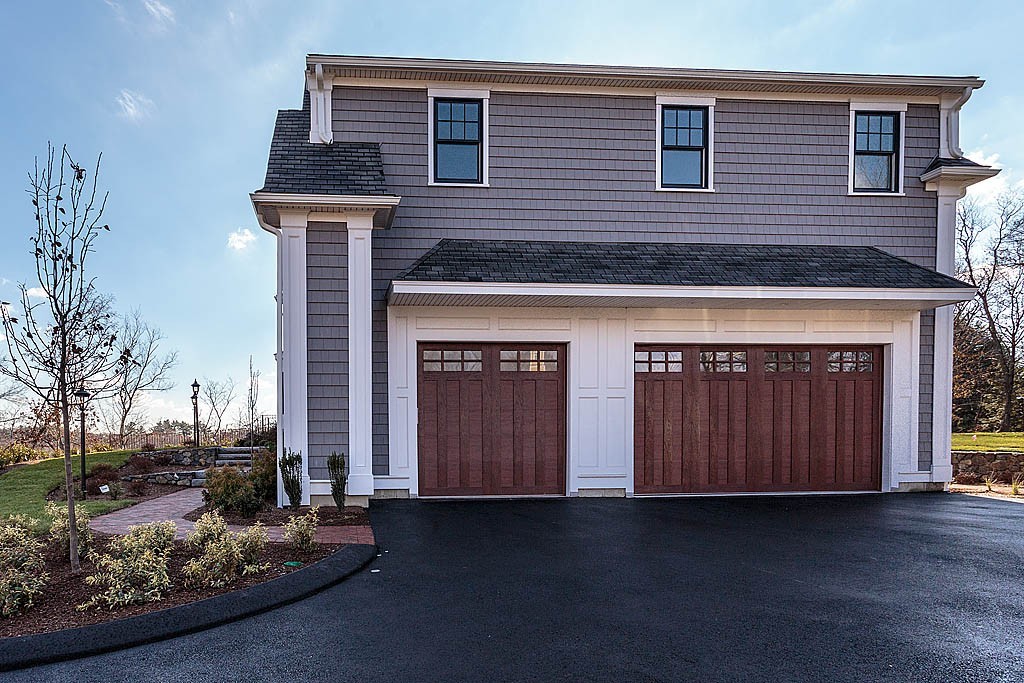 180 Ridge Street Winchester, MA 01890 - Photo 4 of 30 a front view of a house with a yard