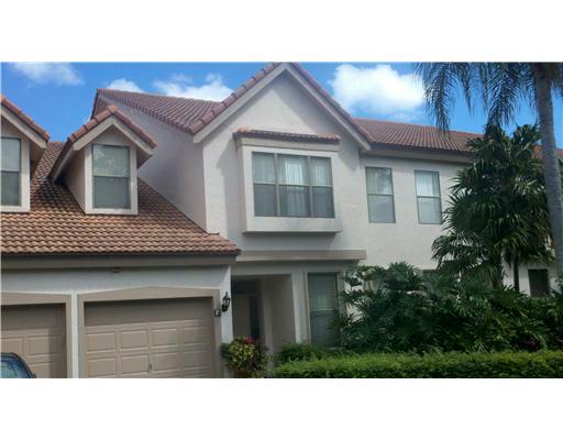 5771 Coach House Circle, Unit B Boca Raton, FL 33486 - Photo 1 of 20 a house view with a garden space