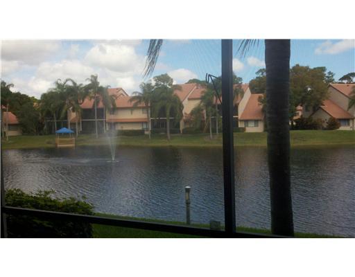5771 Coach House Circle, Unit B Boca Raton, FL 33486 - Photo 19 of 20 a black and white photo of a lake