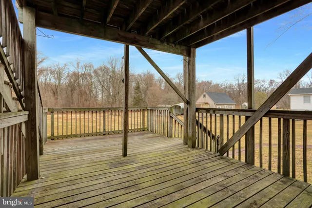 a balcony with hardwood