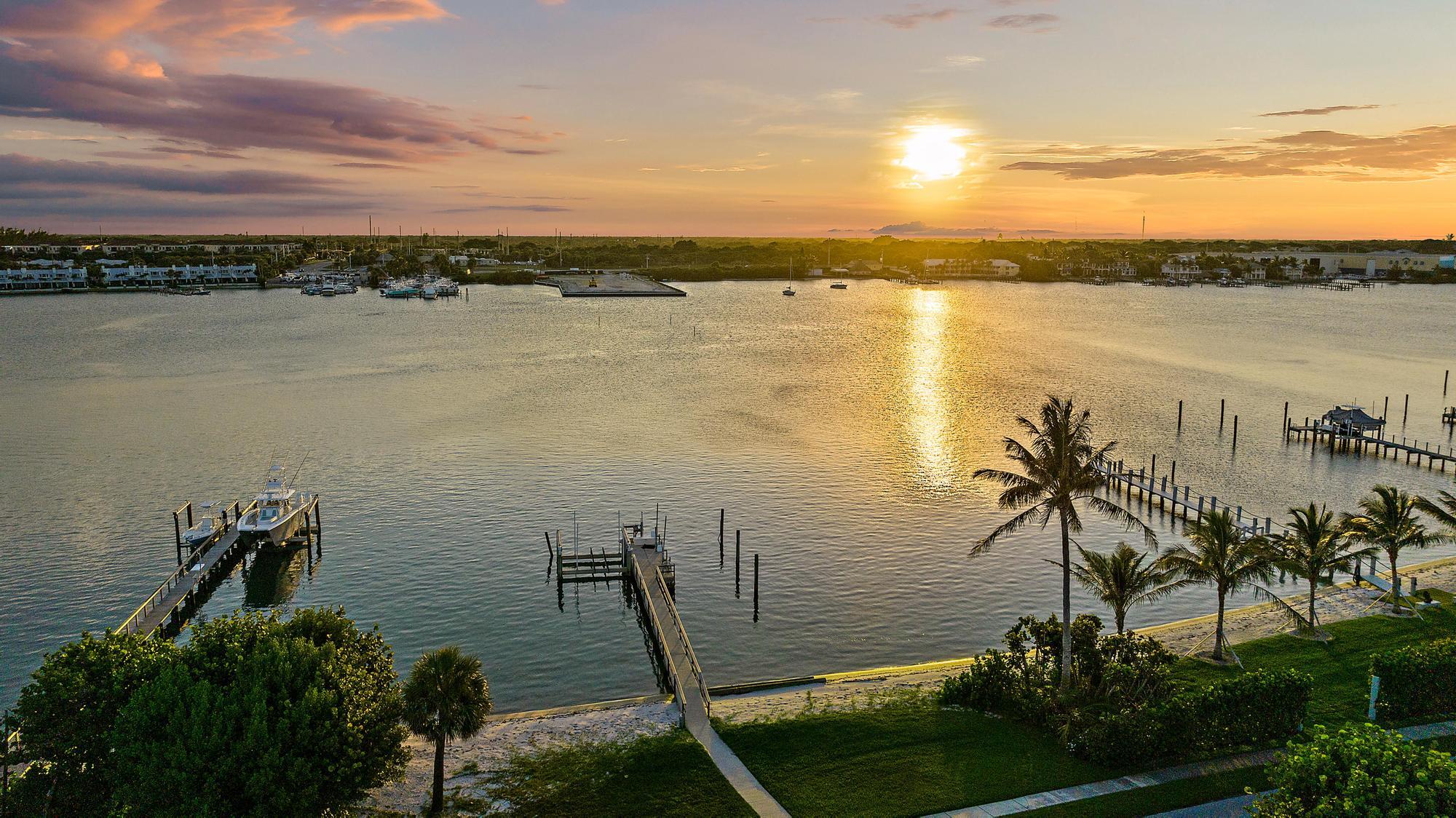 613 South Beach Road Jupiter, FL 33469 - Photo 24 of 74 a view of a lake with outdoor space