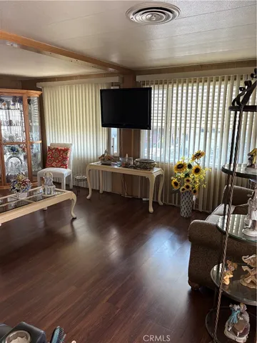a kitchen with a sink cabinets and window