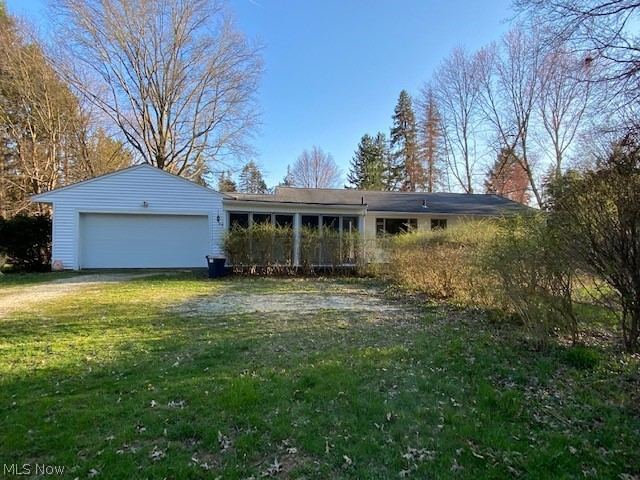 5041 Medina Road Akron, OH 44321 - Photo 19 of 19 2 car garage, covered screened back porch