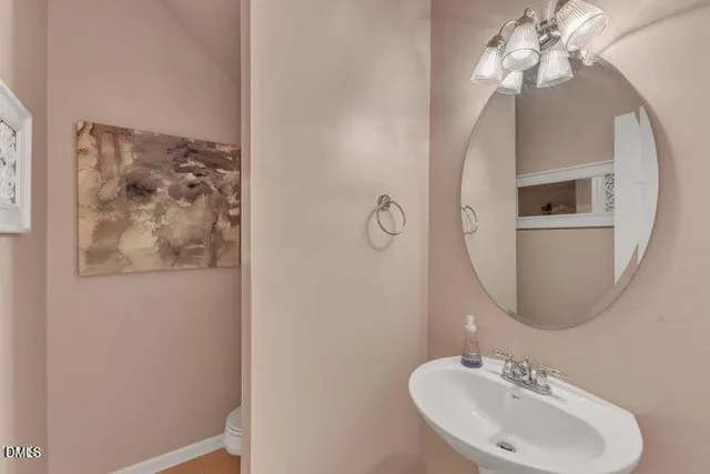 a view of room with window and ceiling fan