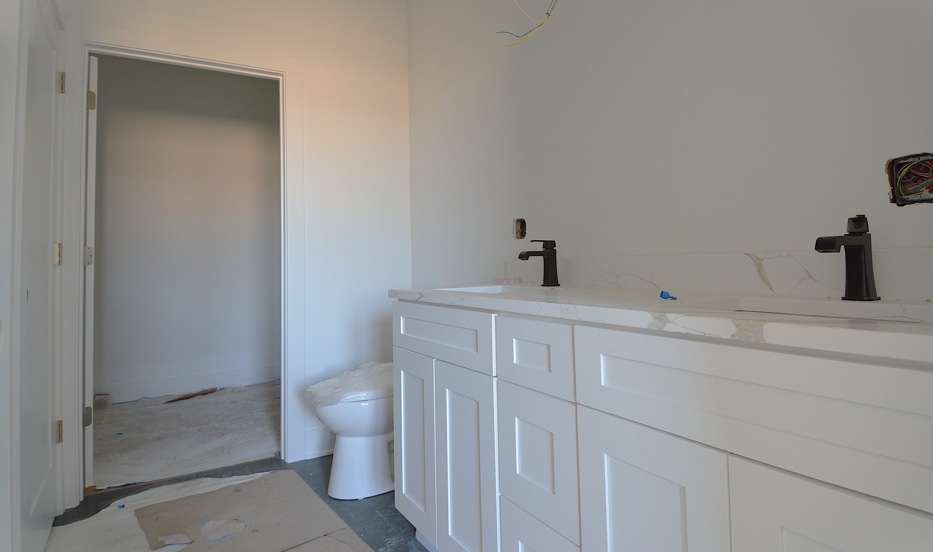 7427 Covington Place Justice, IL 60458 - Photo 3 of 8 a bathroom with a sink and toilet