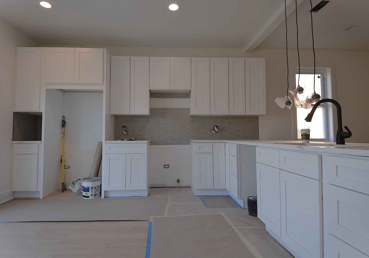 7427 Covington Place Justice, IL 60458 - Photo 5 of 8 a kitchen with white cabinets and sink