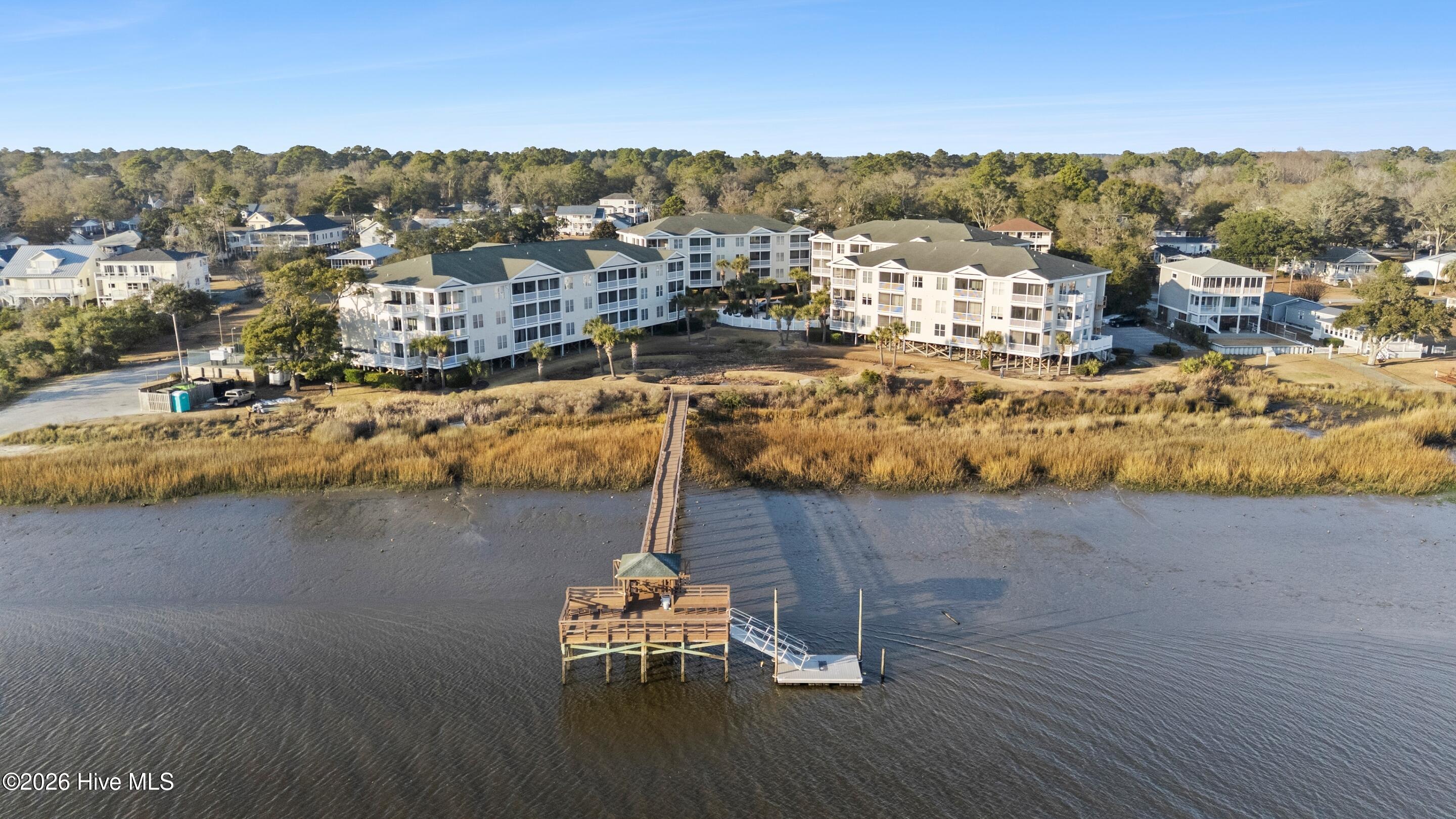 1135 Park Road Southwest, Unit 3101 Sunset Beach, NC 28468 - Photo 2 of 52 mls-DJI_20260106160421_0604_D