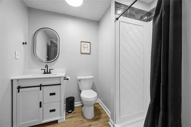 a view of staircase with wooden floor