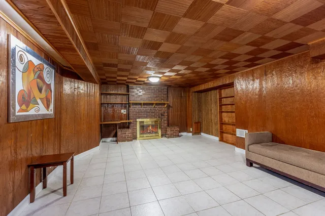 a view of an empty room with a couch