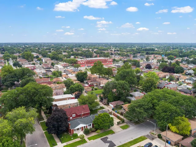 a view of swimming pool and trees in the background