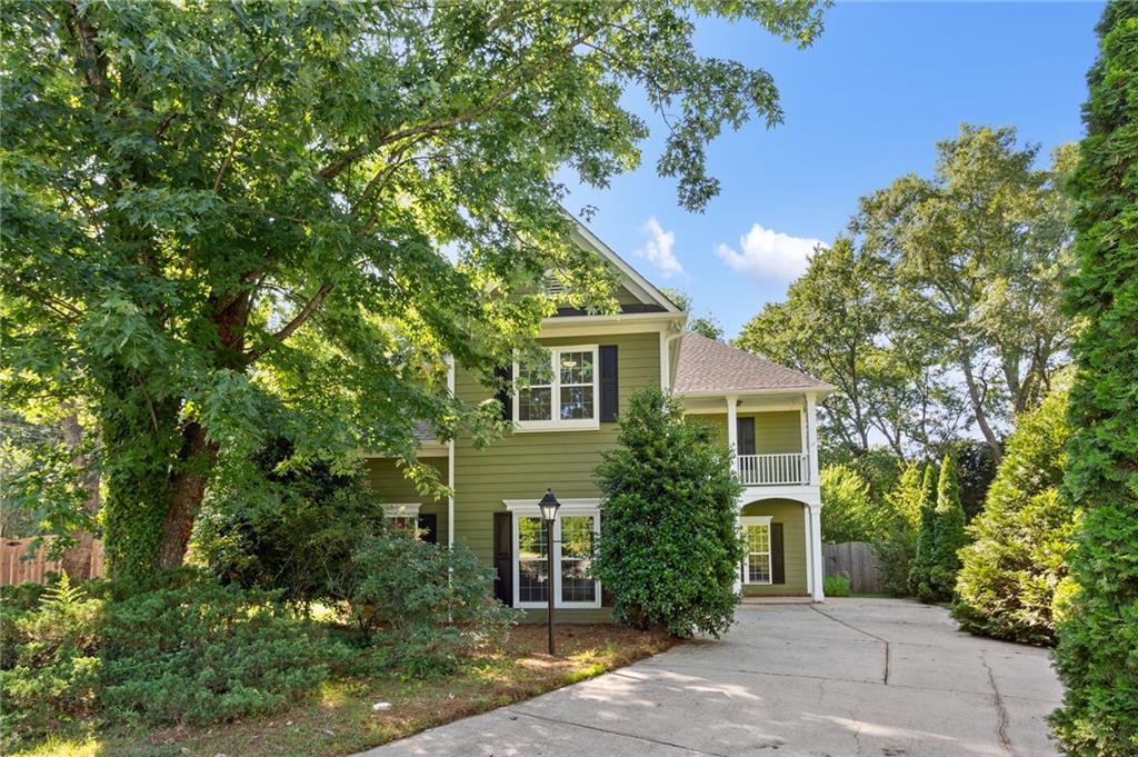 1319 Crescentwood Lane Decatur, GA 30032 - Photo 1 of 1 front view of a house with a garden