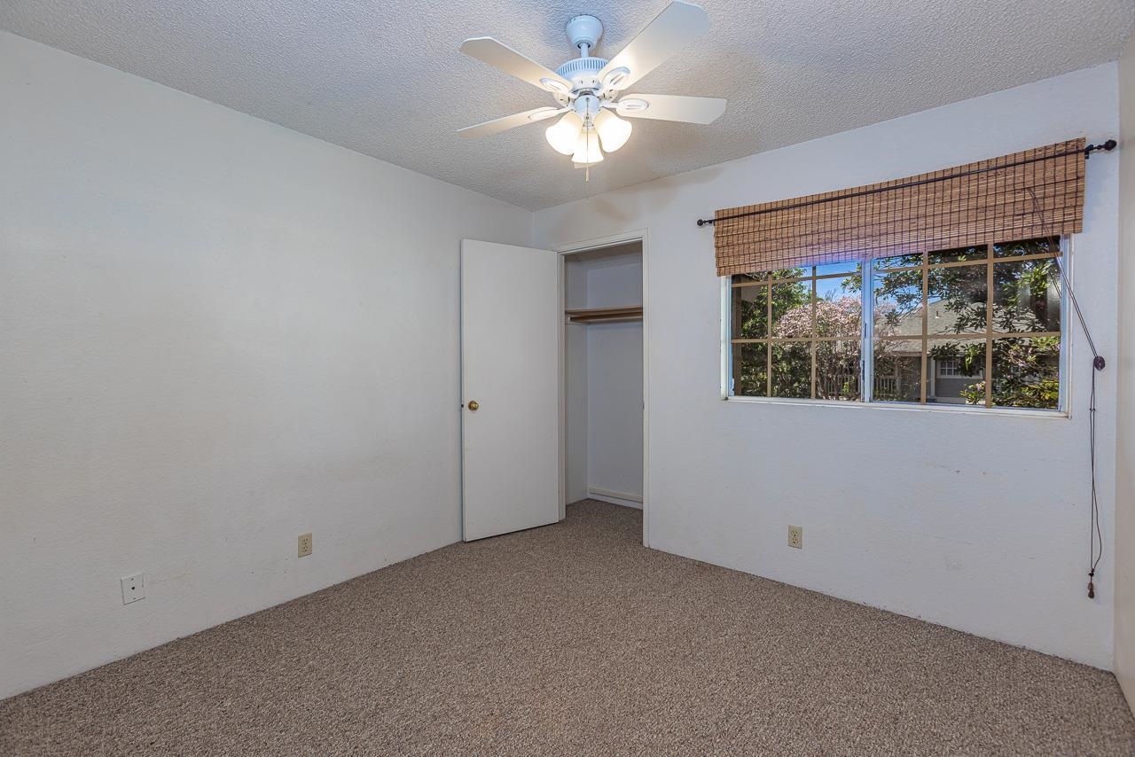140 Uwapo Road, Unit 24202 Kihei, HI 96753 - Photo 19 of 45 an empty room with a window and a fan