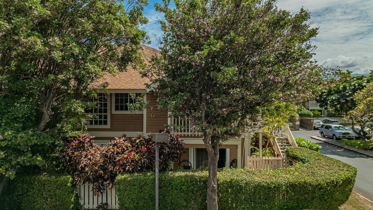 140 Uwapo Road, Unit 24202 Kihei, HI 96753 - Photo 2 of 45 a view of backyard of house with green space