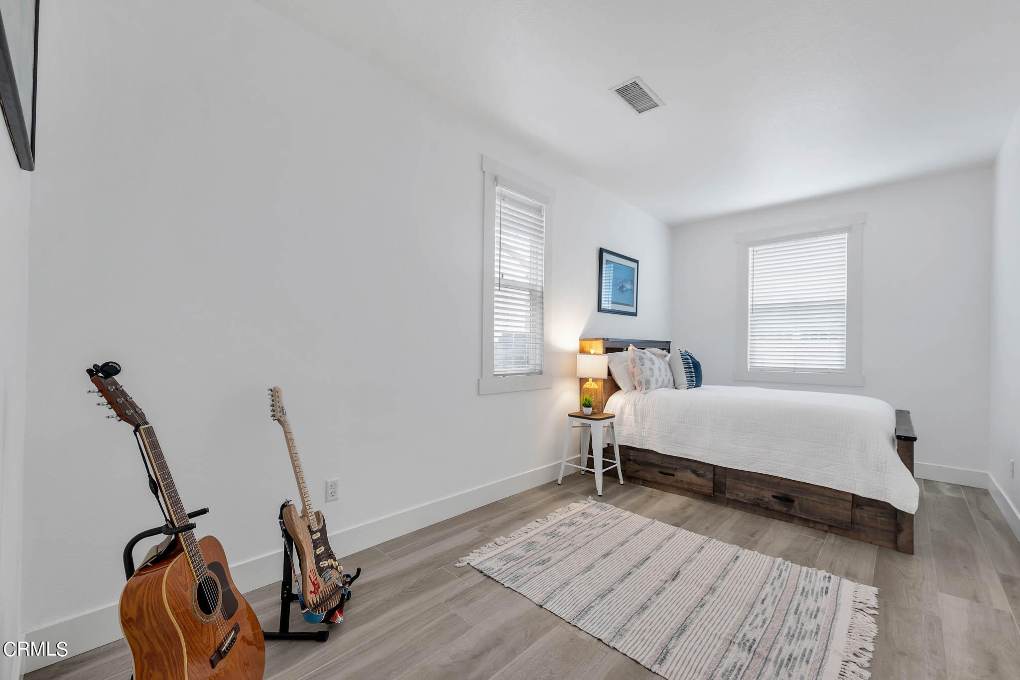 1465 Donegal Way Oxnard, CA 93035 - Photo 25 of 45 a bedroom with bed and a window