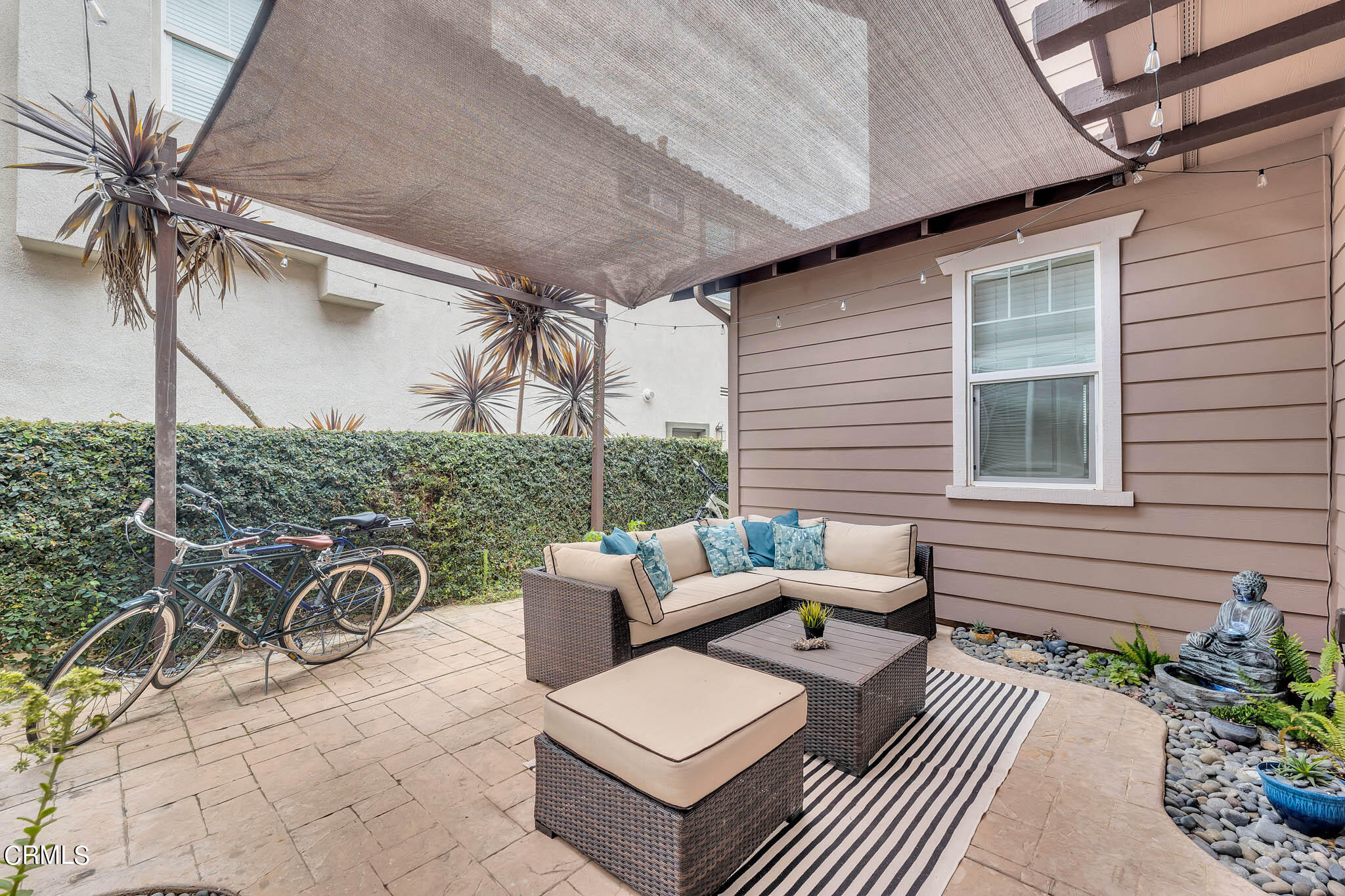 1465 Donegal Way Oxnard, CA 93035 - Photo 31 of 45 a view of a patio with couple of chairs and potted plants