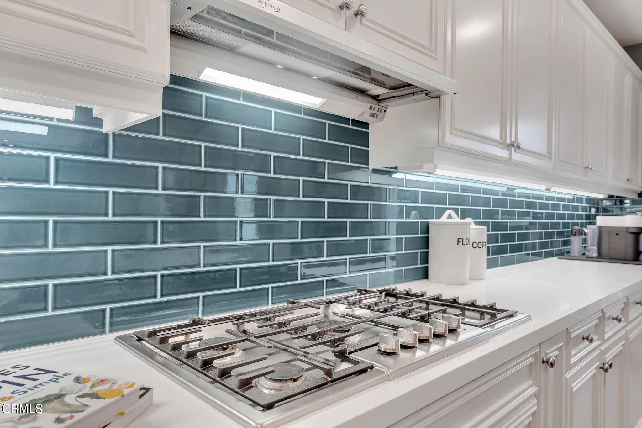 1465 Donegal Way Oxnard, CA 93035 - Photo 10 of 45 a view of a kitchen counter space and wooden floor