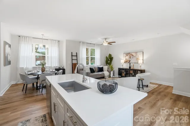 a view of a living room and dining room