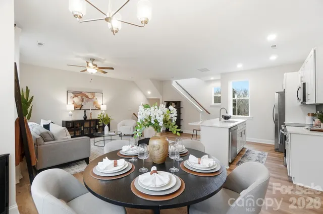 a dining room with furniture and a dining room