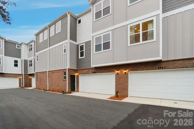 a view of a building with a street