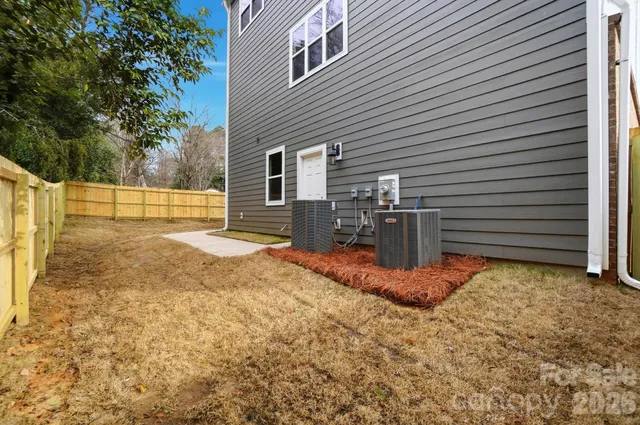 a view of a backyard of the house