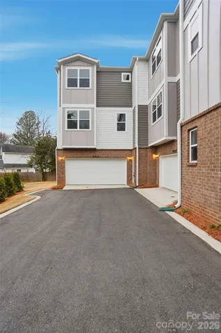 a view of a building with a street