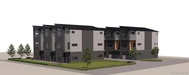 a view of a large building with a yard