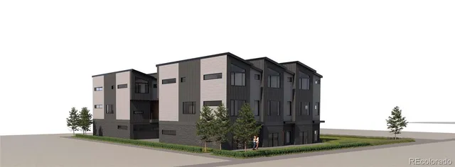 a tall building with a tree in front of it