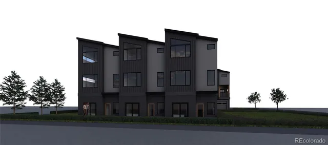 a brick building that has a couple of windows on it