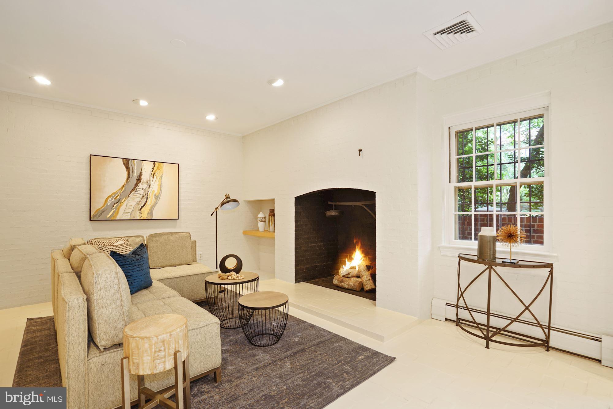 2468 Belmont Road Northwest Washington, DC 20008 - Photo 24 of 28 Lower level family room with walk-in fireplace
