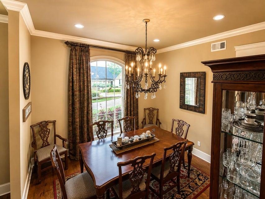 295 North Ridge Drive Saltillo, MS 38866 - Photo 4 of 38 a view of a dining room with furniture a chandelier and wooden floor