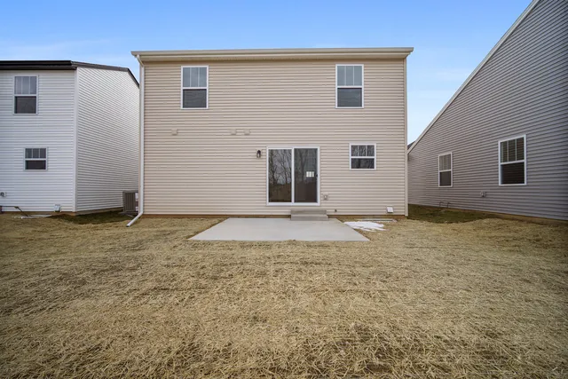 a view of a backyard of the house