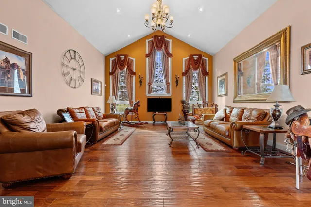 a kitchen with granite countertop a sink a counter top space appliances and cabinets