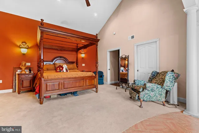 a kitchen with stainless steel appliances granite countertop a sink a stove and a wooden cabinets