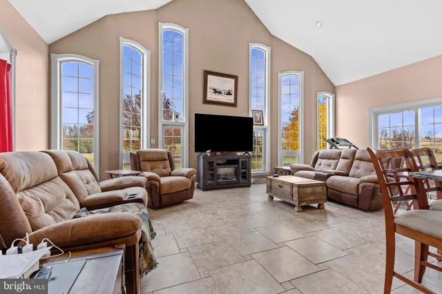 a bedroom with bed and window