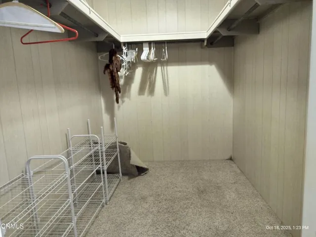 a view of room with a table and chairs