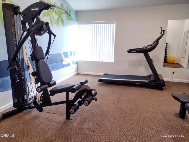 a view of a room with gym equipment
