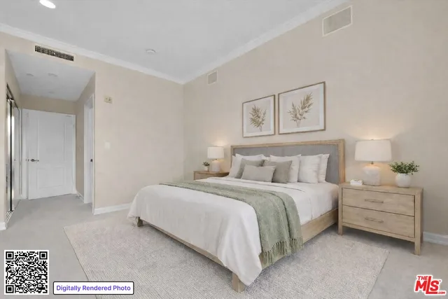 a bedroom with a bed and a night stand