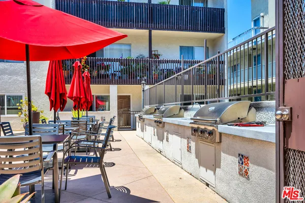 a view of dinning table and chairs in patio