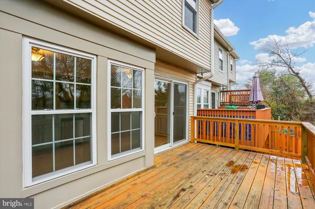 a bedroom with a large bed and a dresser