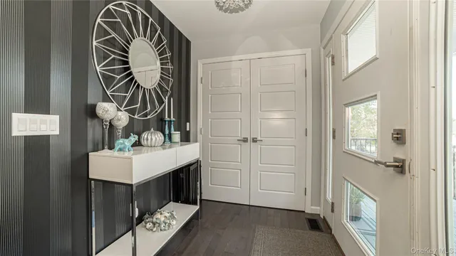 a bathroom with a sink a mirror and a shower