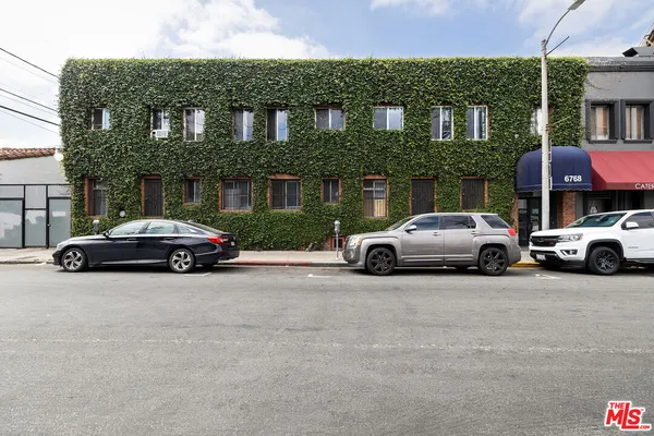 a car parked in front of a house