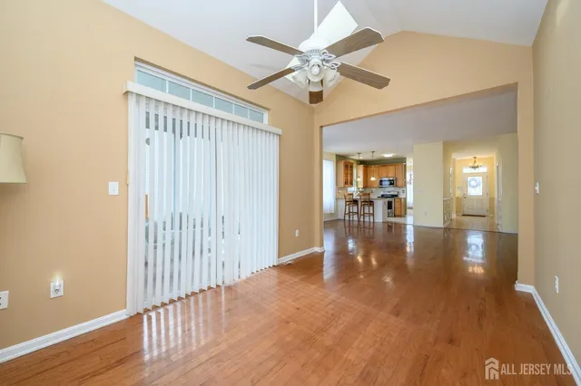 a view of a livingroom with wooden floor