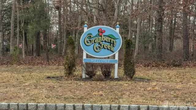 a sign that is on a brick wall