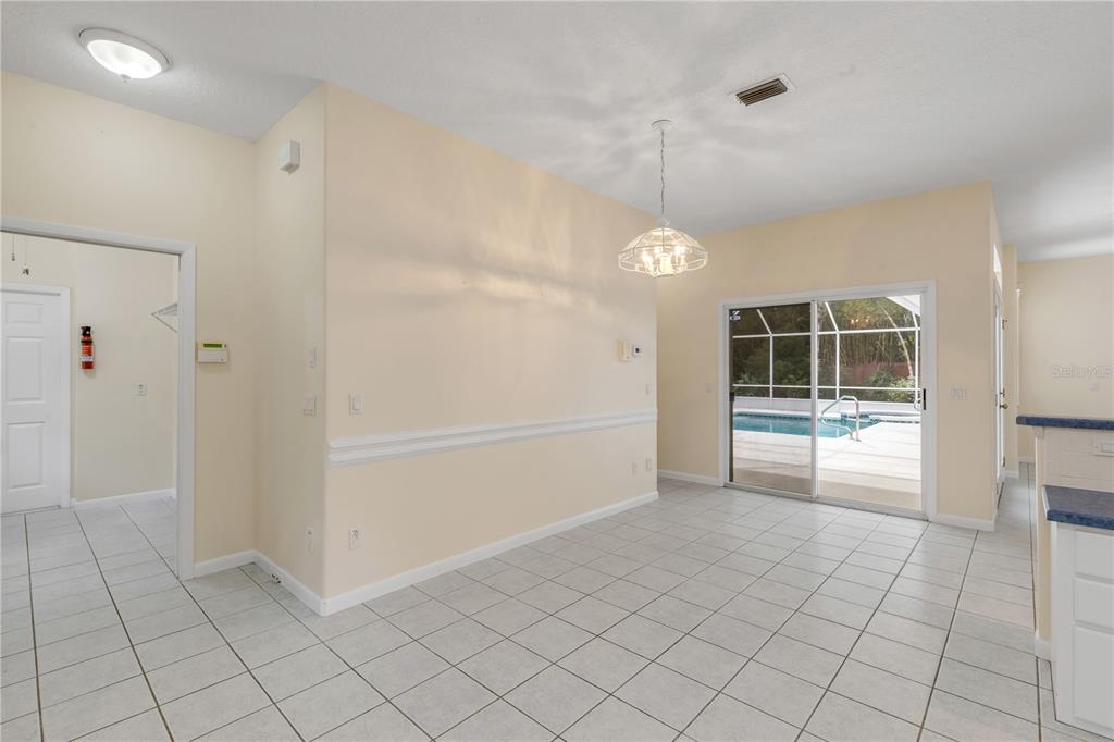 3033 Turnbull Bay Road New Smyrna Beach, FL 32168 - Photo 17 of 54 a view of an empty room with a window
