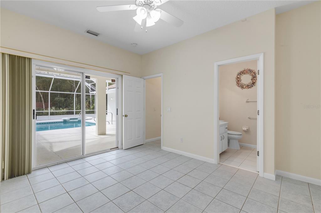 3033 Turnbull Bay Road New Smyrna Beach, FL 32168 - Photo 19 of 54 a view of a livingroom with a fireplace