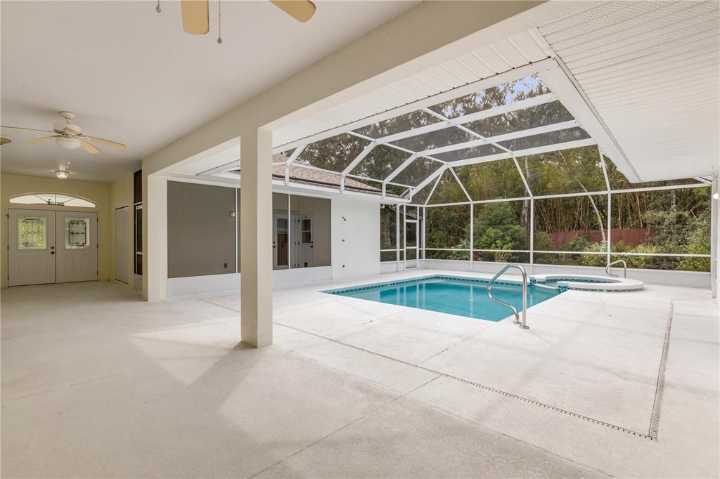 3033 Turnbull Bay Road New Smyrna Beach, FL 32168 - Photo 27 of 54 a view of swimming pool with seating space