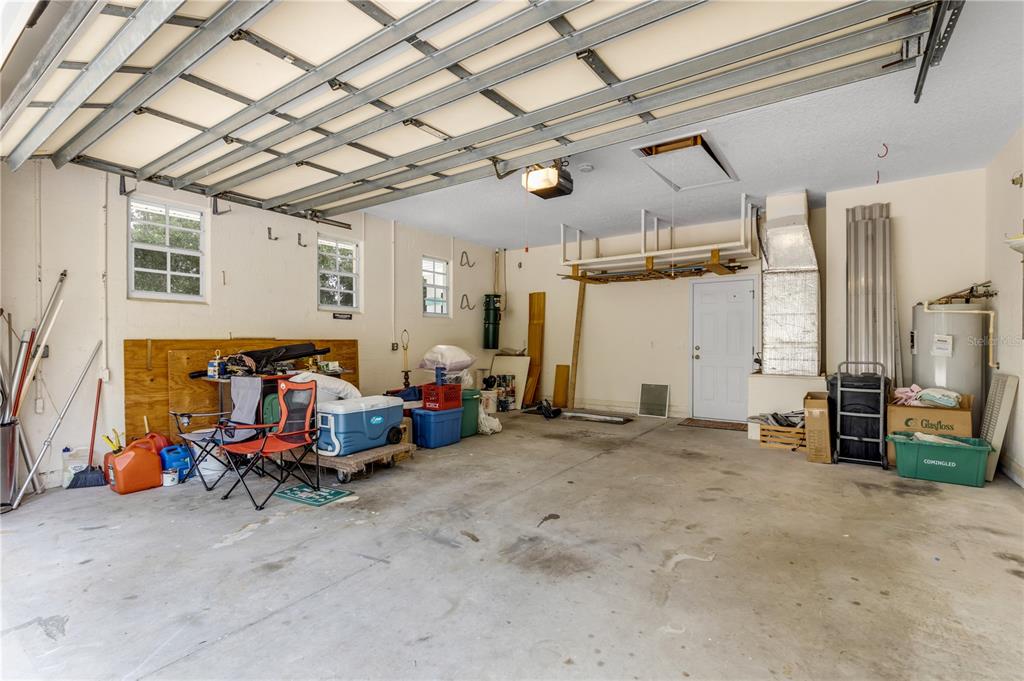 3033 Turnbull Bay Road New Smyrna Beach, FL 32168 - Photo 39 of 54 a view of a room with gym equipment