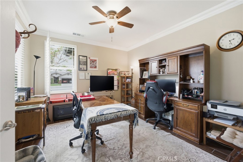 7975 Doyle Circle Hemet, CA 92545 - Photo 11 of 29 a bedroom with a workspace