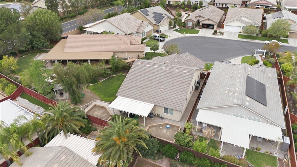 7975 Doyle Circle Hemet, CA 92545 - Photo 25 of 29 an aerial view of a house with a yard and lake view