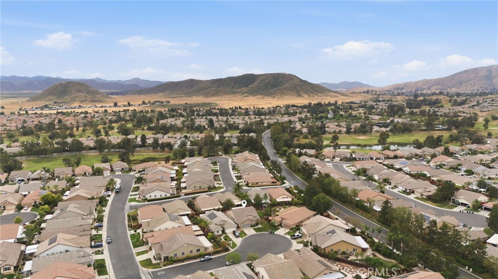 7975 Doyle Circle Hemet, CA 92545 - Photo 26 of 29 an aerial view of residential houses with outdoor space and river